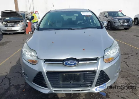 2012 Ford Focus Se z USA, uszkodzony, nr VIN 1FAHP3K29CL131323